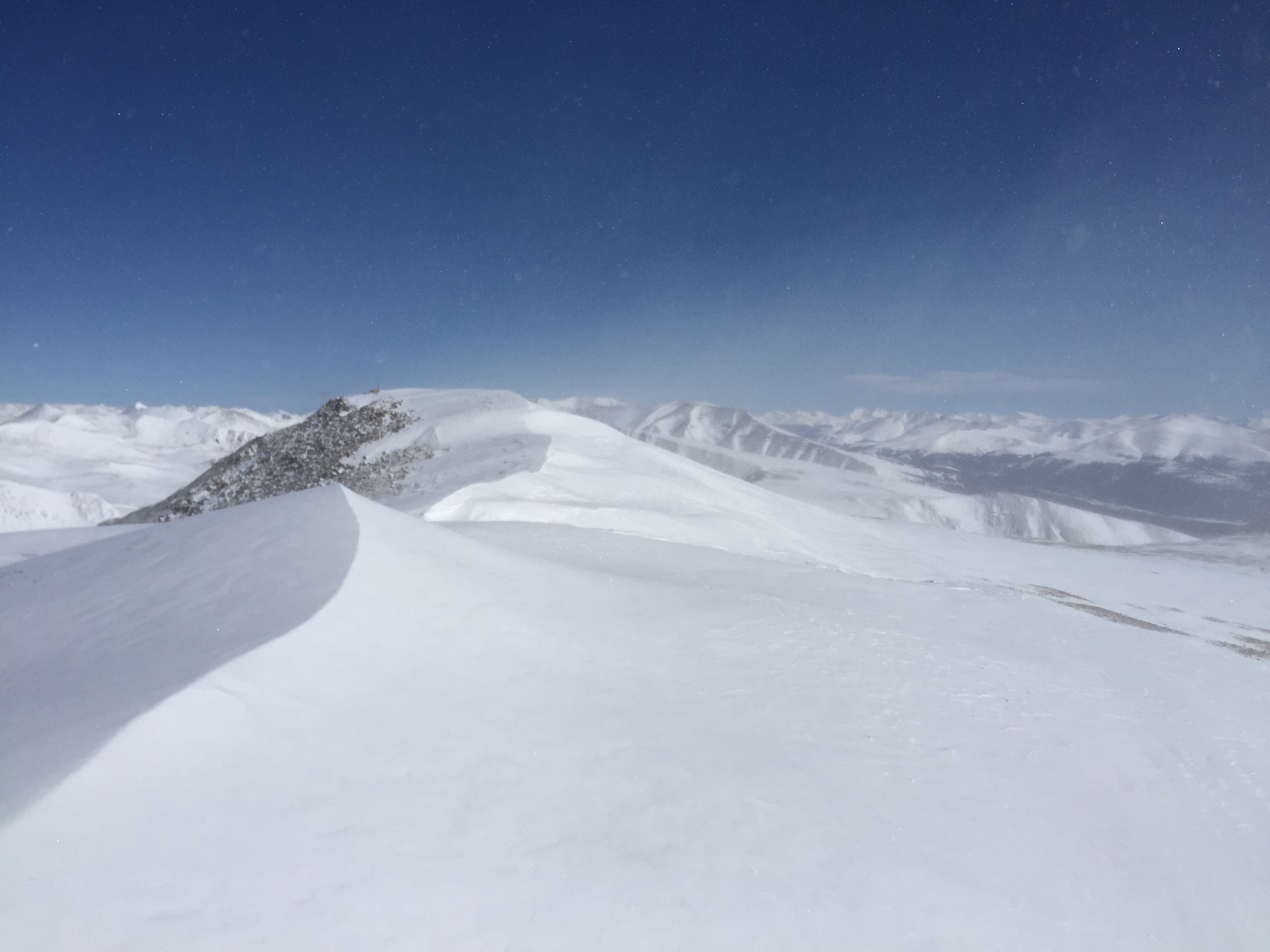 Cool looking snow drifts along the summit. Winds picked up more once we headed down.