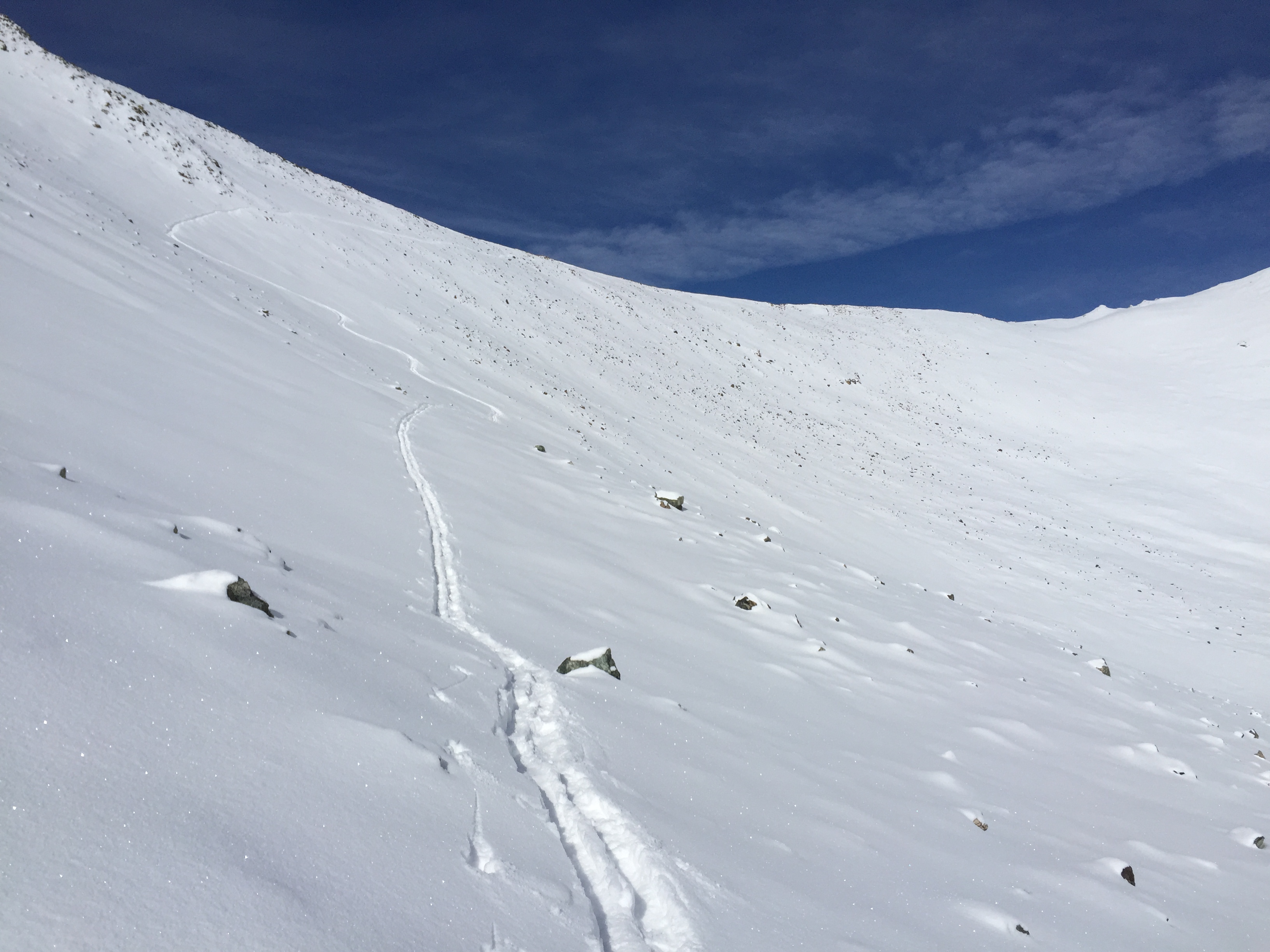 Looking back at my tracks as I traversed around to the northeast side of the peak.